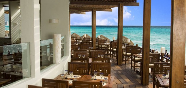 Beachfront restaurant at ME Cancun Complete